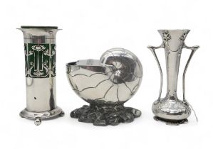 A late-Victorian EPNS nautilus shell spoon warmer, an EPNS mounted glazed earthenware vase, in the