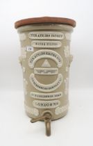 The Atkins patent water filter with wooden lid by The Atkins Filter and Engineering Company Ld, 65