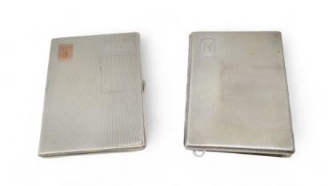 A George V silver cigarette case, by William Neale Ltd, Birmingham 1933, and another similar by