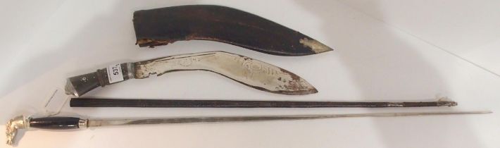 A Nepalese kukri, together with a stiletto dagger modelled as a riding crop (2) Condition Report: