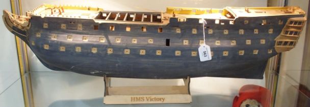 A partially constructed wooden model of HMS Victory, measuring approx. 90cm from prow to stern