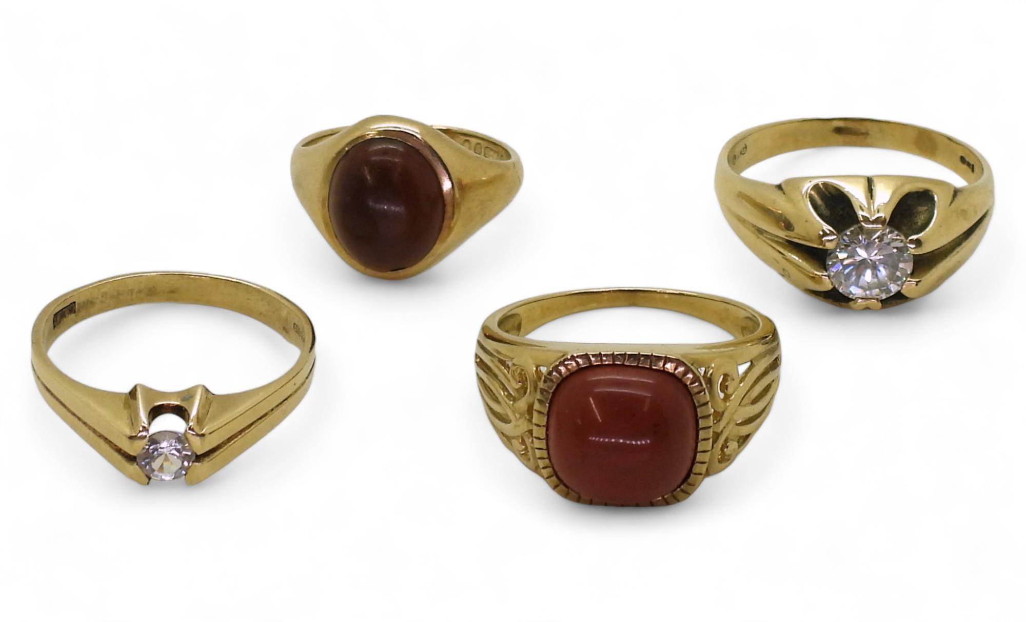Four 9ct gold rings, large cz gypsy ring Z1/2, smaller example V1/2, red jasper W, brown gemN1/2.