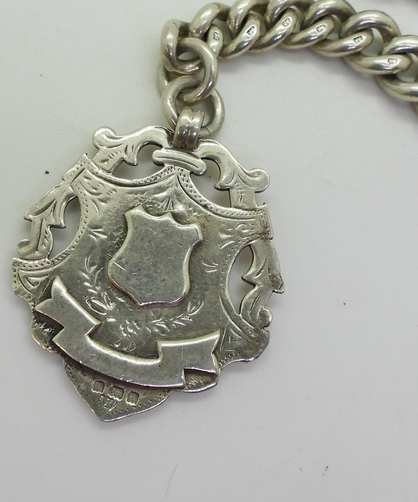 A heavy silver tapered fob chain with silver medallion, hallmarked to every link, tapers from 12.1mm - Image 4 of 4