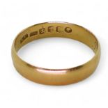 A Victorian Glasgow hallmarked wedding ring date 1884, size T1/2, weight 3.2gms Condition Report: