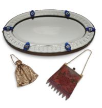 An oval mirror with cut decoration, together an  Art Deco metal purse and Edwardian purse (3)