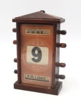 An early-20th century perpetual desk calendar, measuring approx. 22cm in height Condition Report:
