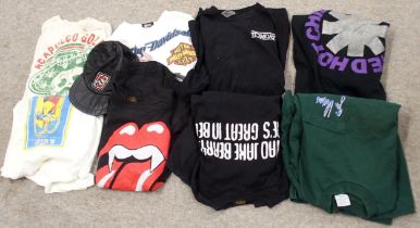 A lot of various tour T Shirts with The Rolling Stones to include a leather cap, Red Hot Chilli