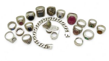 A collection of silver and white metal, a curb chain bracelet, gem set rings to include man made