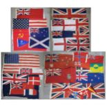 A quantity of assorted maritime flags, to include various British Ensigns, one being mounted on a