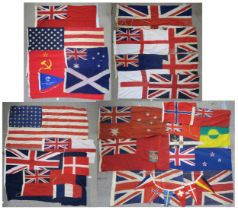 A quantity of assorted maritime flags, to include various British Ensigns, one being mounted on a