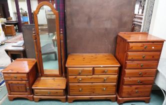 A 20th century stained pine bedroom suite comprising six drawer tall chest, 118cm high x 58cm wide x