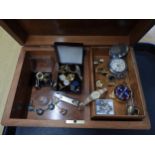 An inlaid wooden jewellery box, with vintage cufflinks, a heavy silver band ring, a Sekonda pocket