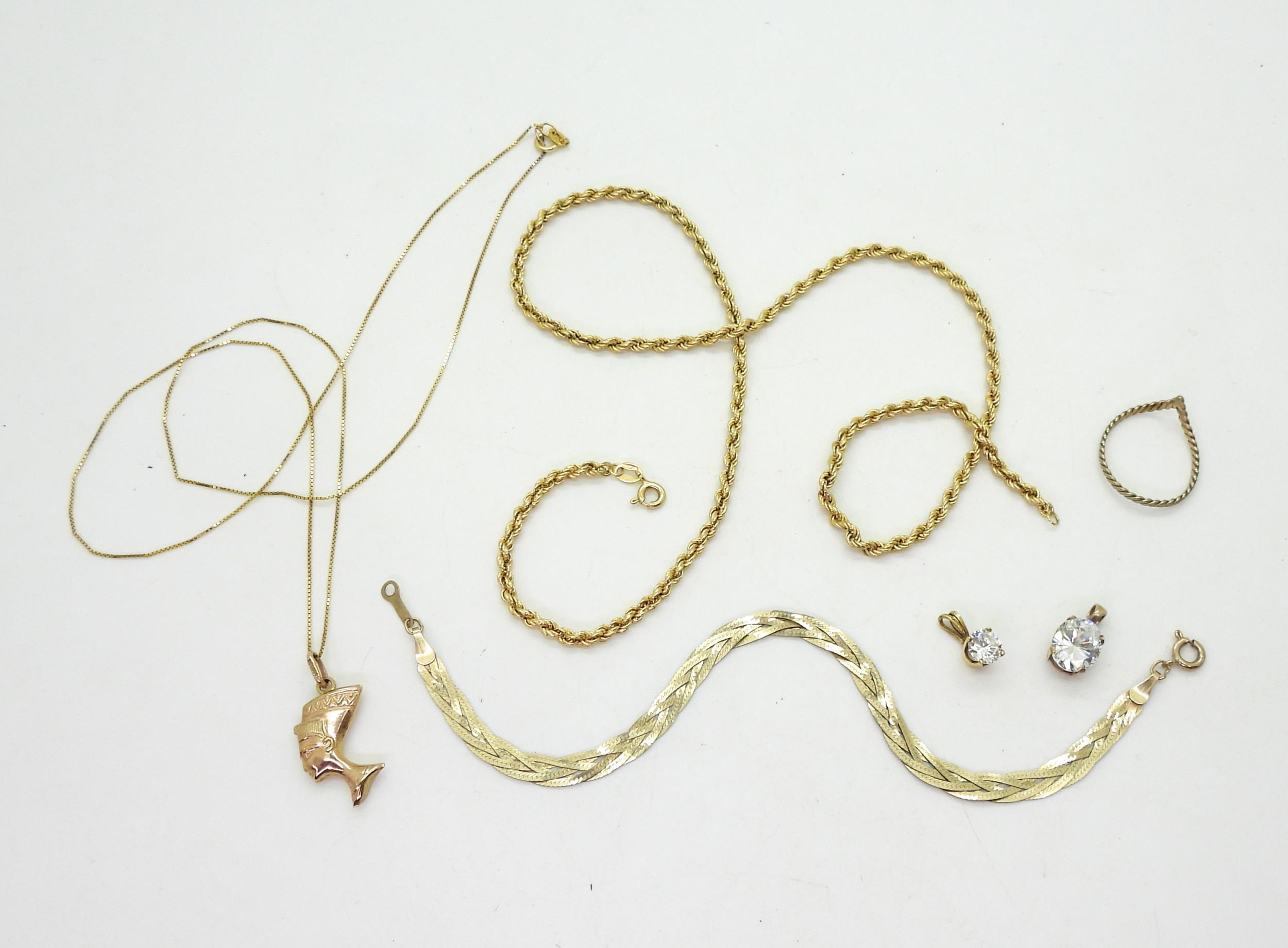 A collection of gold and yellow metal to include a braided 9ct bracelet, 9ct rope chain a - Image 2 of 3