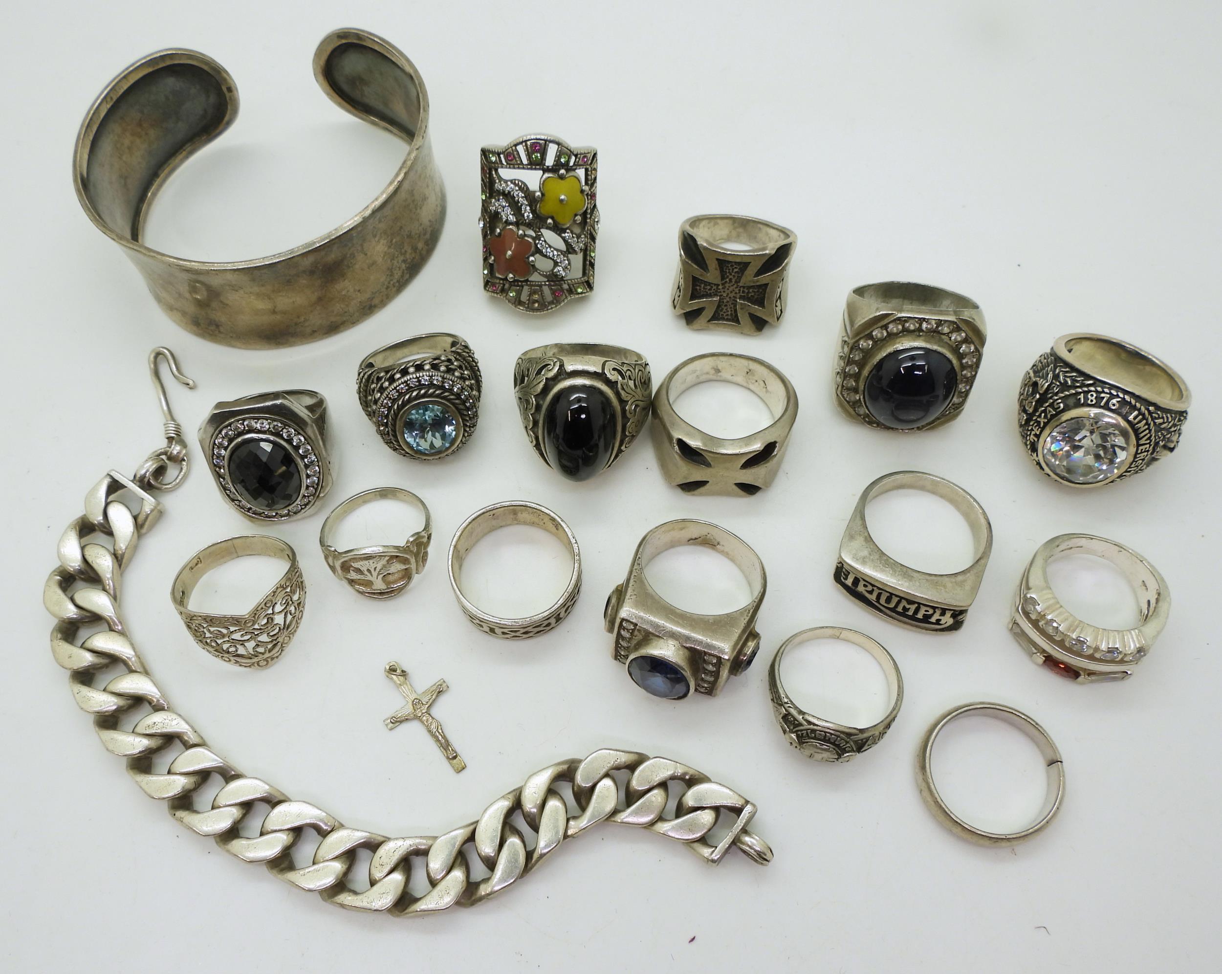 A collection of silver and white metal to include a bangle, curb chain bracelet, American college - Image 2 of 2
