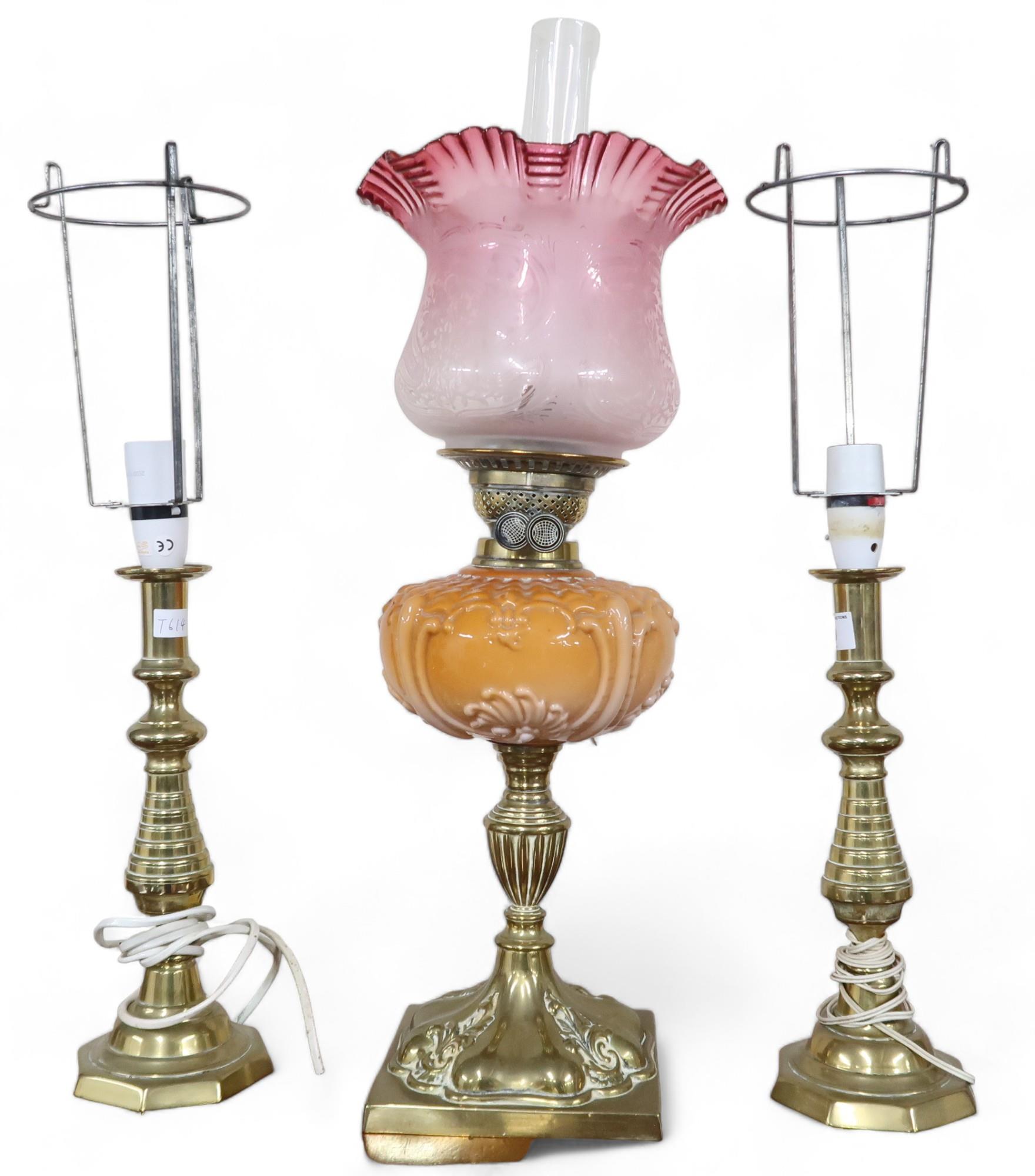 A lot comprising 19th ceramic and brass oil lamp, pair of brass based table lamps and a brass