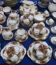 A Royal Albert Old Country Roses dinner and tea service comprising six dinner plates & pudding