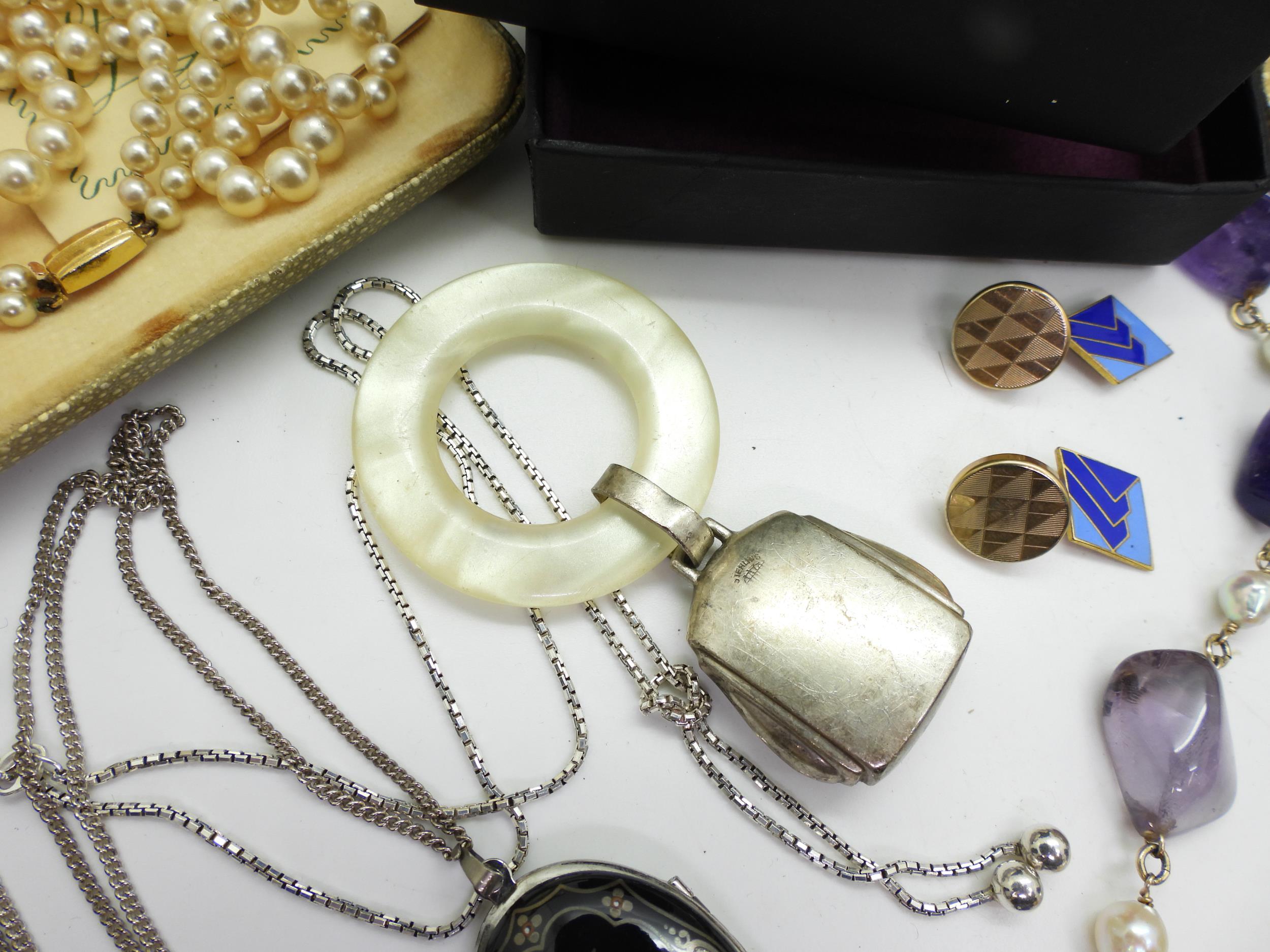 A silver baby's rattle, a Chanel brooch dated 1997, a Michaela Frey Style locket, Ciro faux pearls - Image 3 of 3