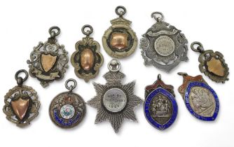 Various silver award medallions to include a Scots Guard example dated 1889, A further enamelled