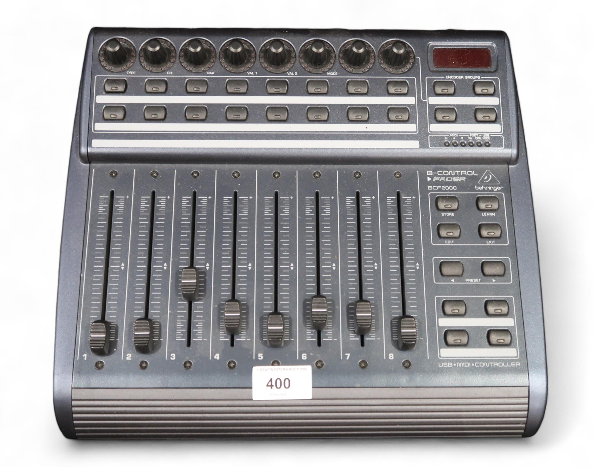 A Behringer BCF2000 - Motorised MIDI Fader Controller (af) This lot is from the estate of the late