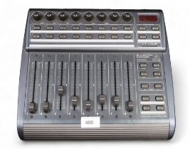 A Behringer BCF2000 - Motorised MIDI Fader Controller (af) This lot is from the estate of the late