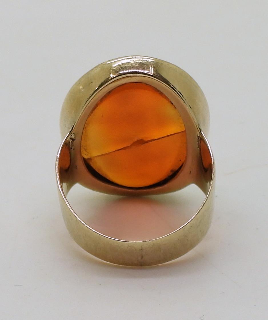 A bright yellow metal signet ring set with a large carnelian intaglio carved with Brittania ( - Image 6 of 6