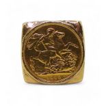 A Gents yellow metal ring, set with a 1910 full gold sovereign, size W1/2, weight 48.1gms