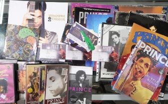 A collection of The Artist Formerly known As Prince memorabilia with Welcome to America W2A
