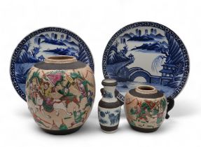 A Nanking 'Warriors' ginger jar, 22cm, a smaller example, 13cm, two Japanese blue and white