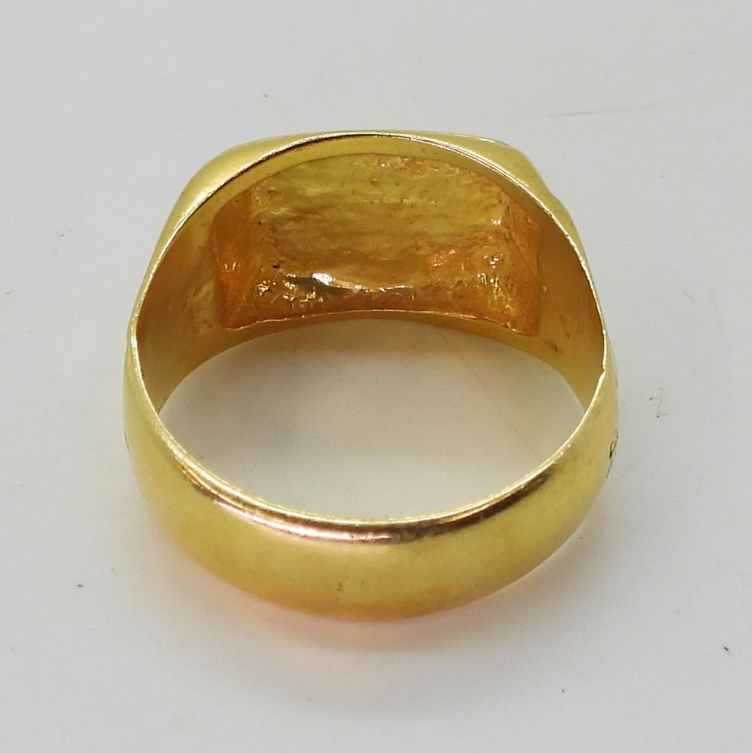 A bright yellow metal signet ring, (stamped 22c) size W, weight 11.8gms Condition Report:Available - Image 4 of 4