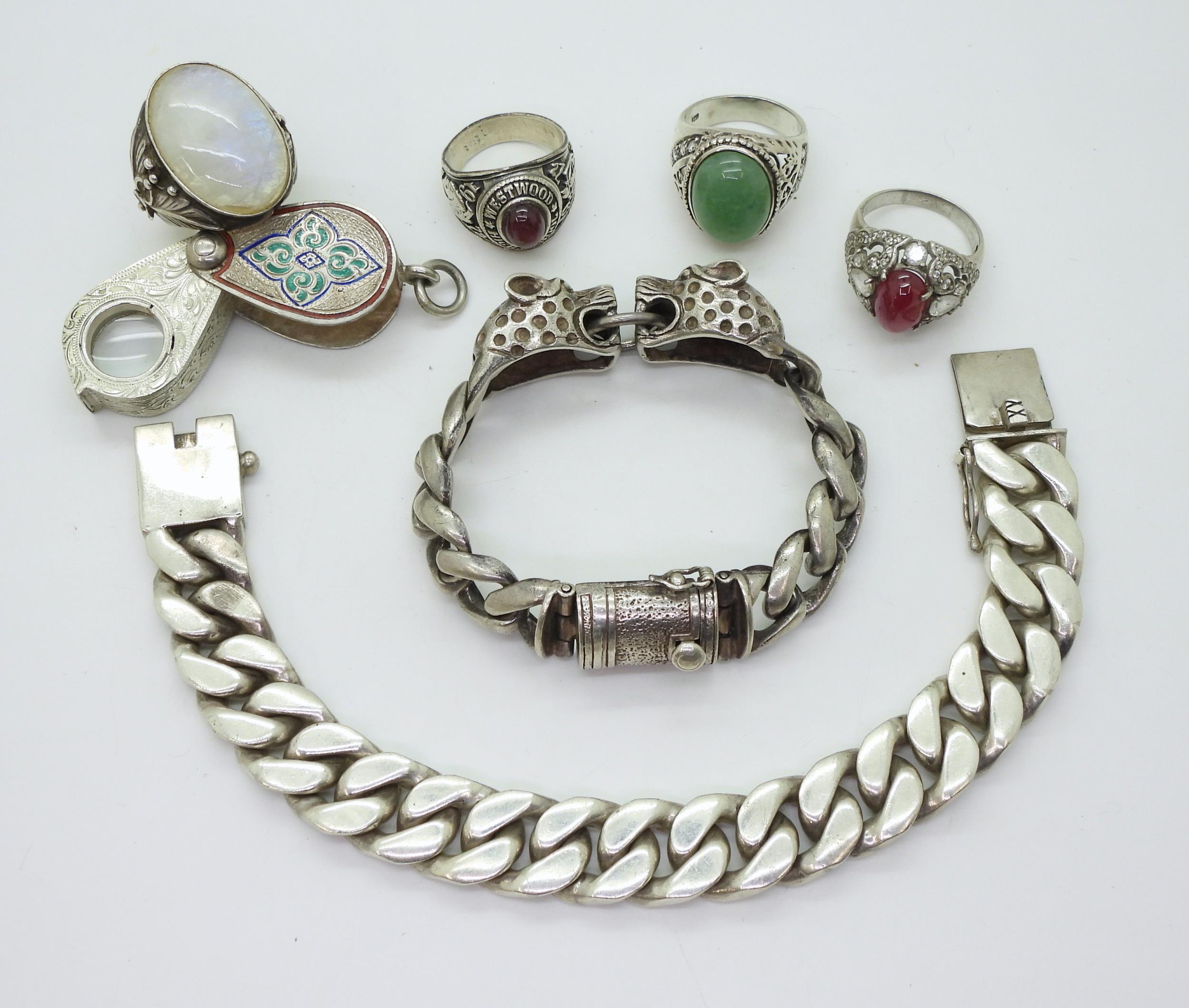 A white metal curb chain bracelet with leopard's head finials, a further example both stamped 925, a - Image 2 of 5