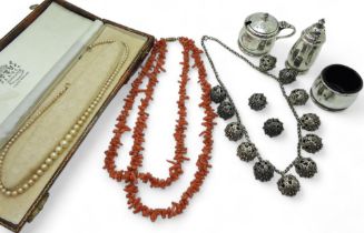 A coral fringe necklace, filigree ball necklace, Asprey & Co silver cruet set and other items