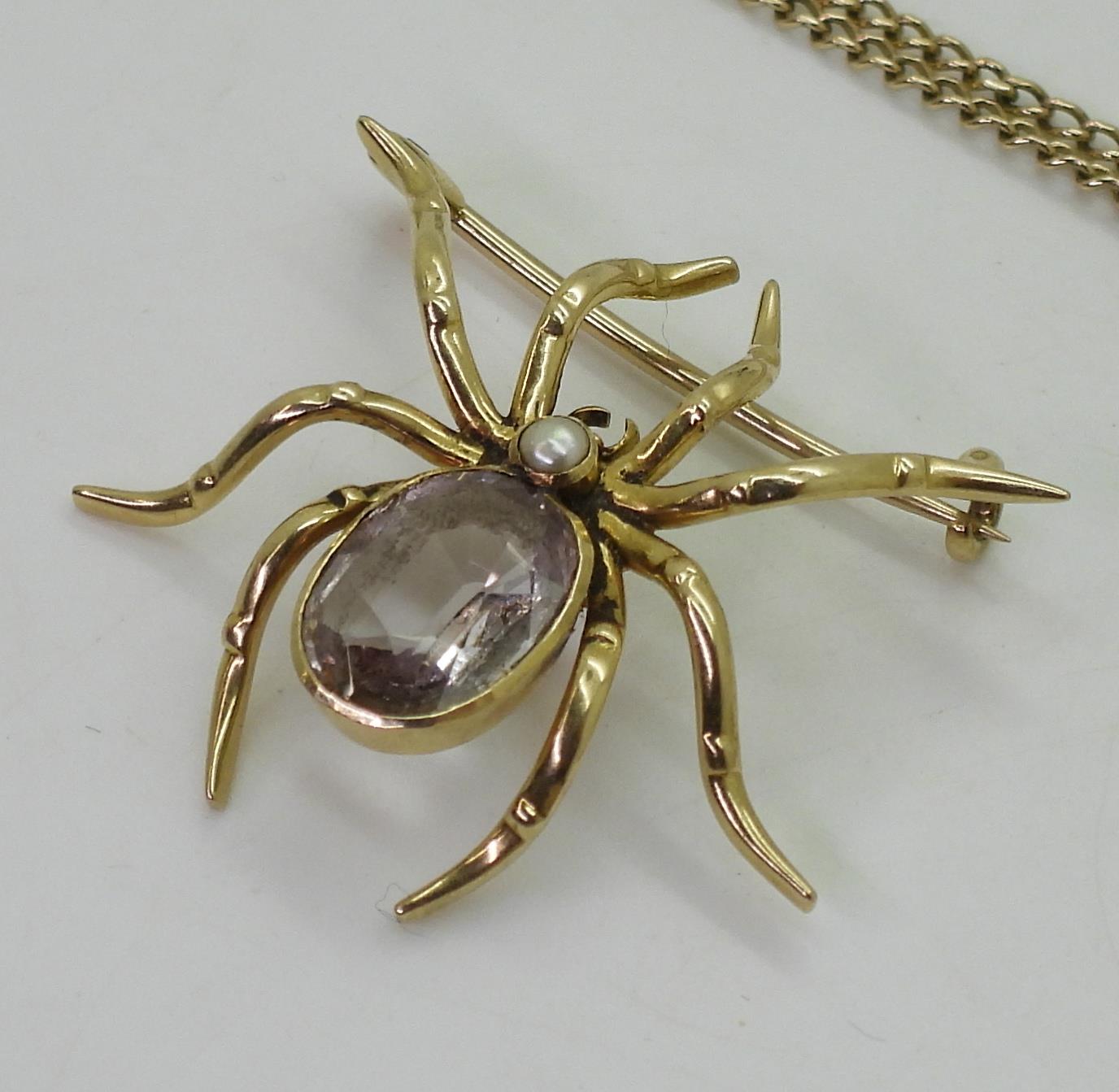 A yellow metal amethyst spider brooch, together with a 9ct gold citrine fob seal (af) and 68cm - Image 4 of 4