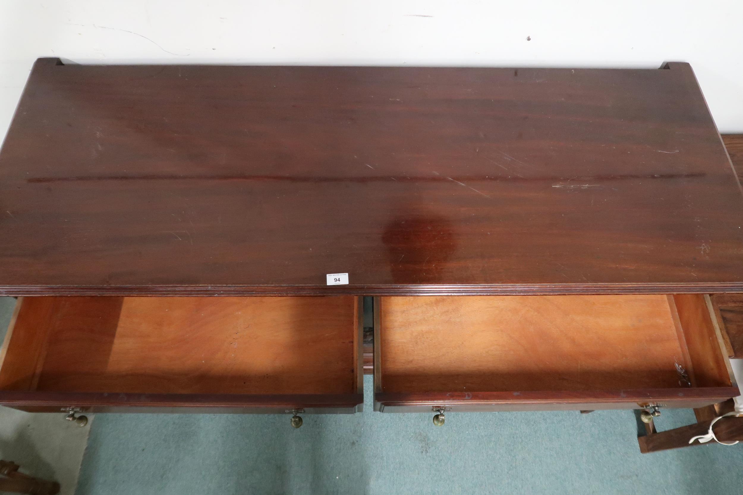 An early 20th century mahogany sideboard with two long drawers over three cabinet doors on Queen - Image 2 of 2