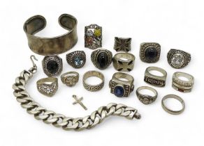 A collection of silver and white metal to include a bangle, curb chain bracelet, American college