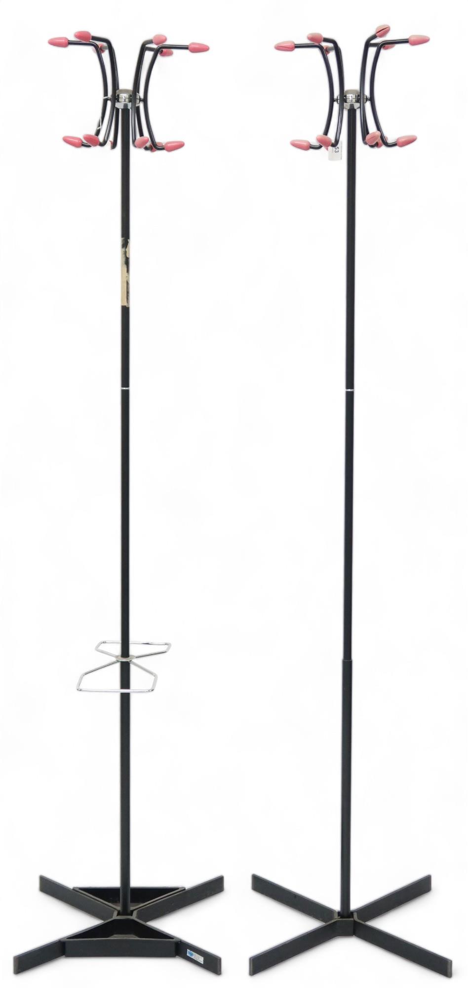 A pair of mid 20th century Hago "Sputnik" hat & coat stands one with umbrella stands and drip trays,