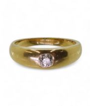 An 18ct gold dome ring set with an estimated approx 0.15ct old cut diamond, size K1/2, weight 4.5gms