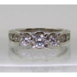 An 18ct white gold diamond ring, with 1.50cts of brilliant cut diamonds set to the bezel,