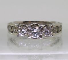 An 18ct white gold diamond ring, with 1.50cts of brilliant cut diamonds set to the bezel,