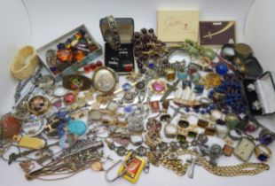 A collection of vintage costume jewellery to include Russian examples, retro cufflinks tie slides,