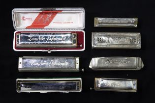 Larry Adler Professional 16 Chromatic Harmonica with box and another together with a Hero harmonica
