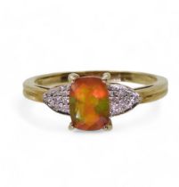 A 9ct gold Rocks & Co fire opal and diamond ring, size N1/2, weight 2.1gms Condition Report: