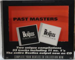 The Beatles a record shop display for the release of Past Masters 33 track compilation compact discs