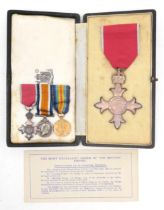 A cased Most Excellent Order of the British Empire (M.B.E.) medal, together with a possibly