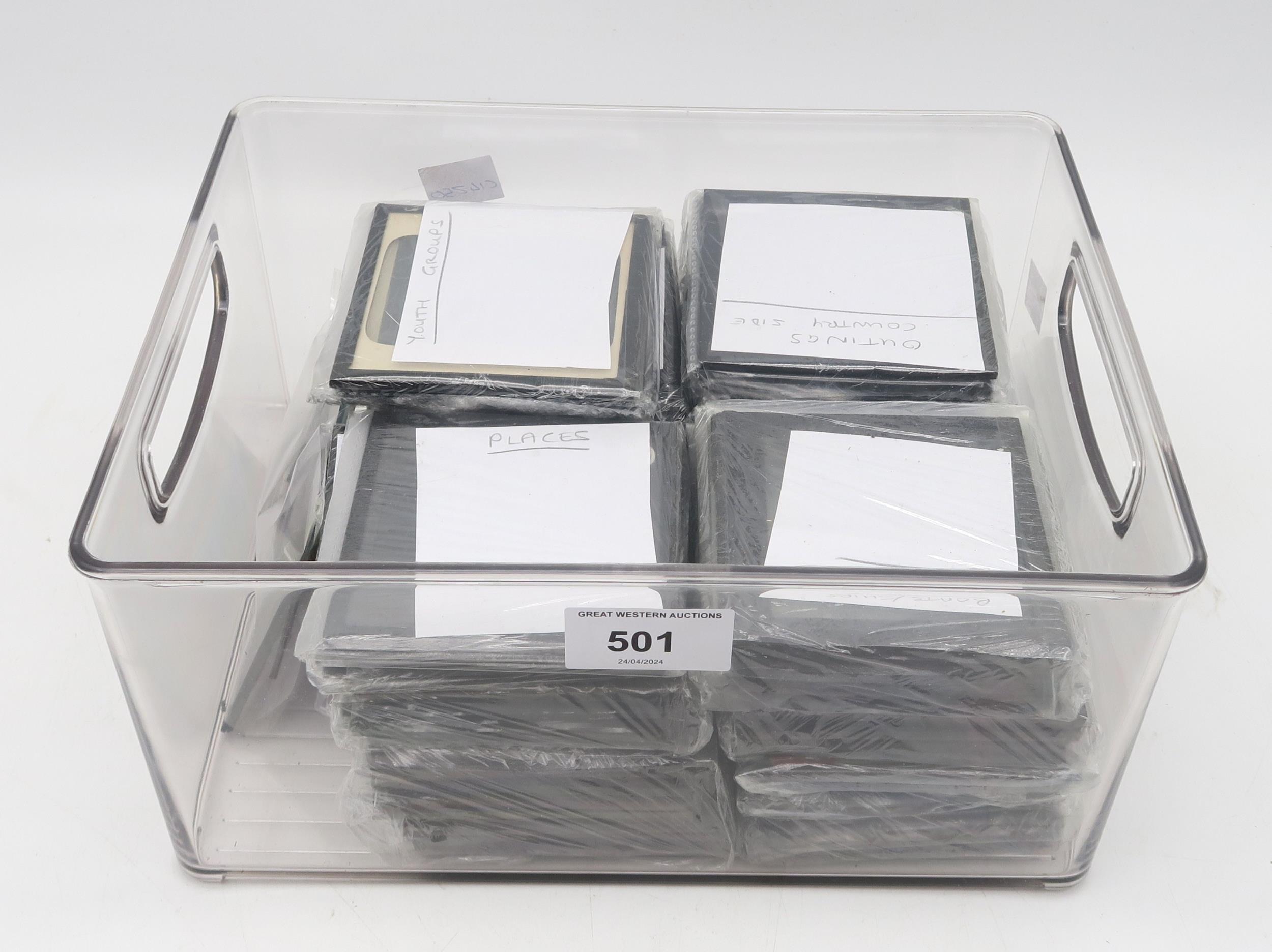 A collection of early-20th century glass photographic lantern slides, relating to members of the