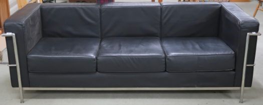 A 20th century after Le Corbusier with black vinyl upholstery on chromed tubular frame, 70cm high