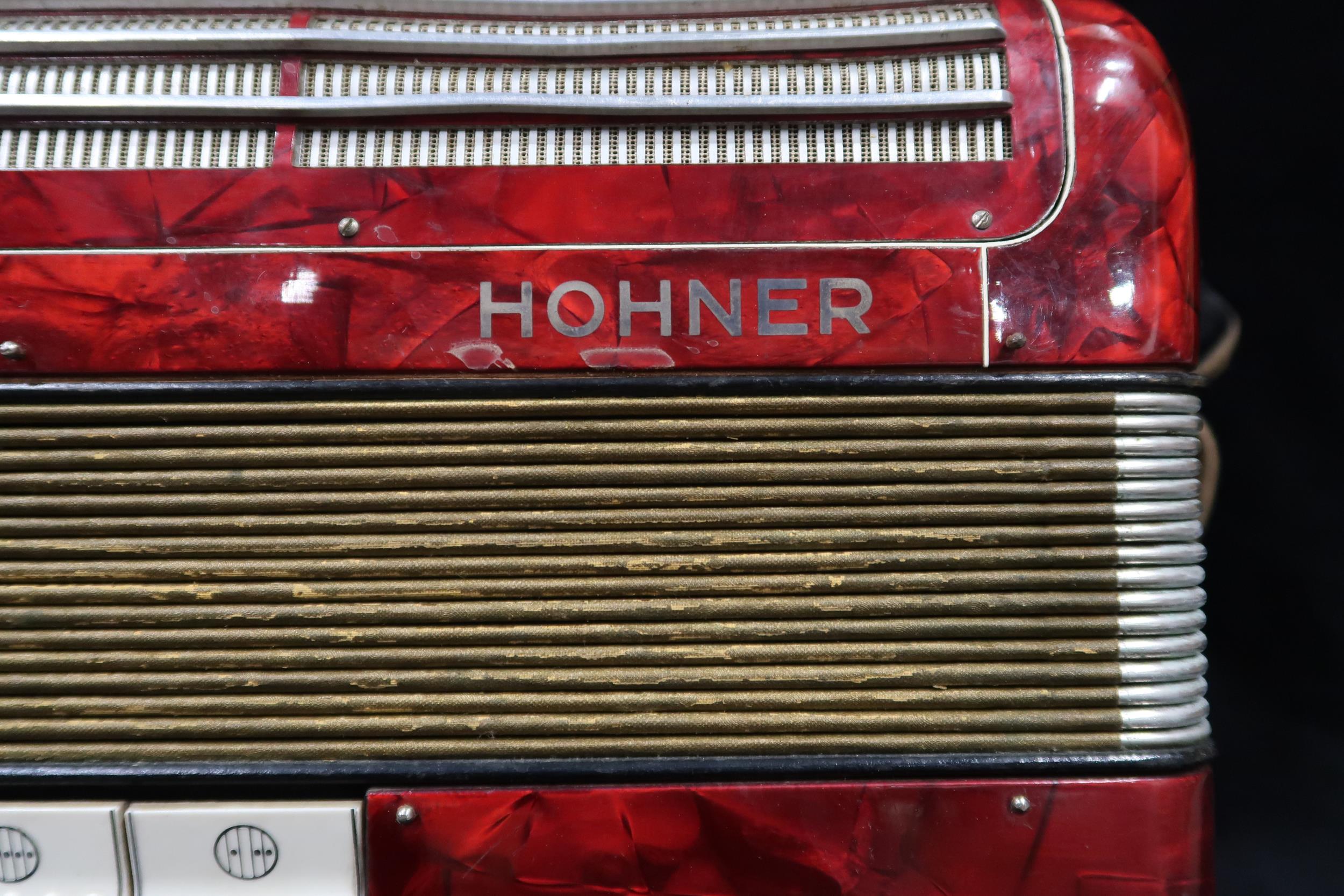 A HOHNER TANGO II M 96 bass  37 key piano accordion in red with case Condition Report:Available upon - Image 3 of 11