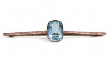 A 9ct gold bar brooch set with a blue gem, weight 3.2gms Condition Report:Available upon request
