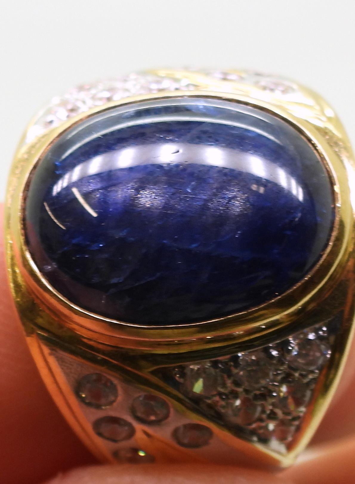 A yellow metal ring set with a star sapphire and clear gems, size S, weight 13.7gms Condition - Image 7 of 7