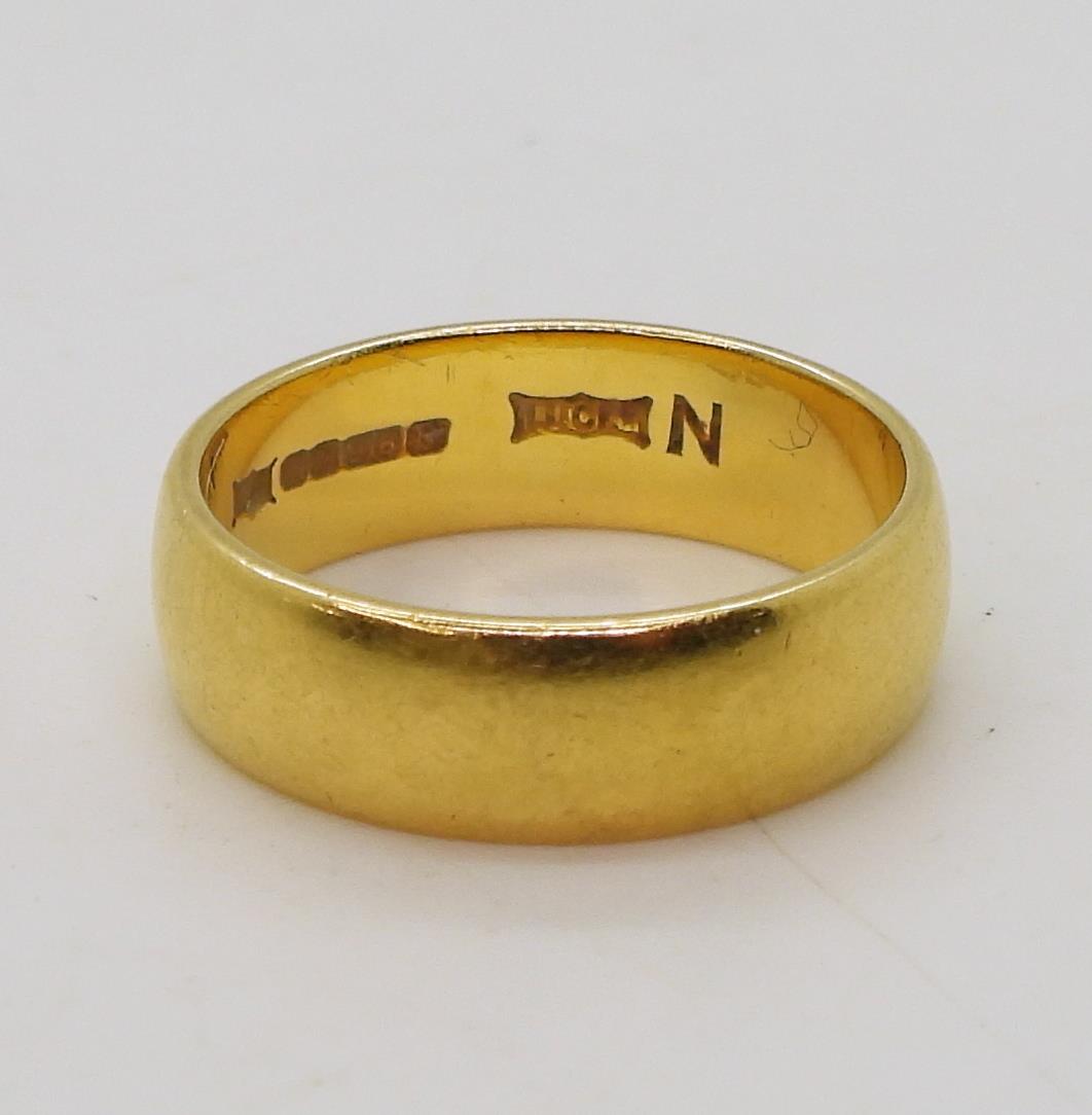 A 22ct gold wedding ring, size N1/2, weight 6.9gms Condition Report:Available upon request - Image 2 of 3