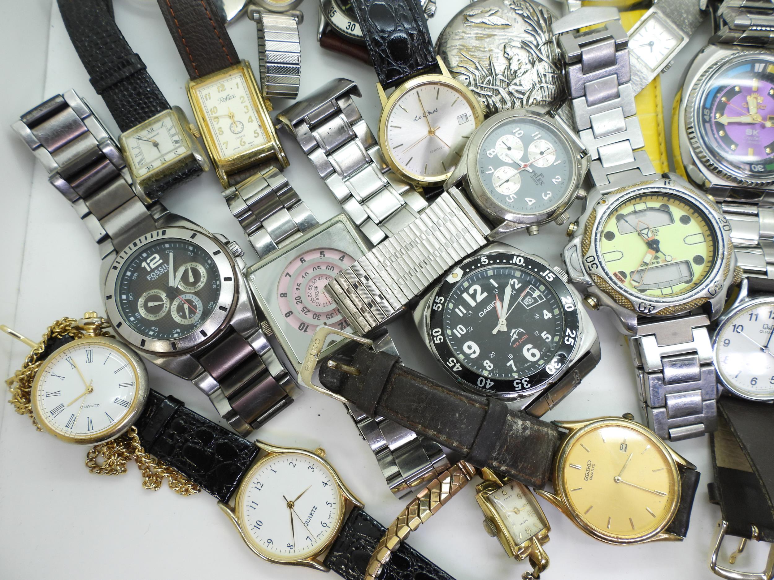 A collection of fashion watches to include, Orient, Sekonda, Casio, Timex, Seiko, and replicas - Image 6 of 6